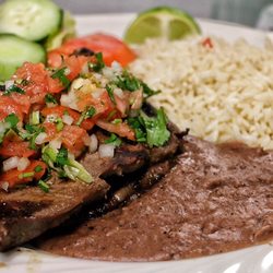 Deli Pupuseria - Carne Asada! Served with rice, beans, salad avocado, cheese, & 2 tortillas!