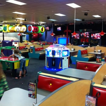 Chuck E. Cheese - a kid playing a game - Pizza Near Me - Tupelo, Mississippi Chuck E. Cheese - a kid playing a game - Pizza Near Me - Tupelo, Mississippi