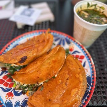 Tacotlan - a plate of food and a drink - Mexican Near Me - Chicago, Illinois