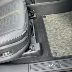 Rivian - Body shop dust at new vehicle delivery.