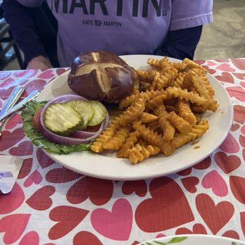 Czech Town Station - Grilled spicy chicken on a yummy pretzel bun. - Bars Near Me - Cedar Rapids, Iowa