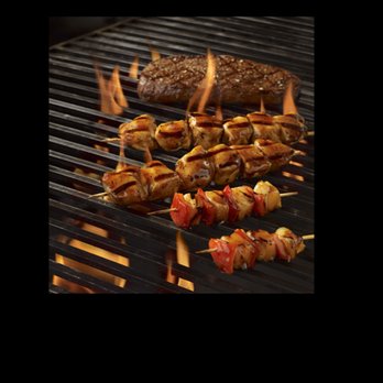 St-Hubert Express - a grill with skewers of meat and vegetables - Chicken Shop Near Me - Quebec City, Quebec St-Hubert Express - a grill with skewers of meat and vegetables - Chicken Shop Near Me - Quebec City, Quebec