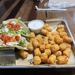 East Coast Wings + Grill - Teriyaki chicken tacos and tots. Ranch on the side of course