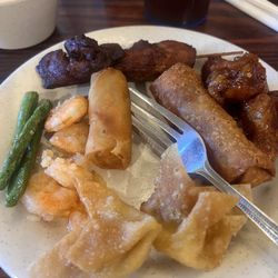 Hibachi Buffet - Green beans, crab Rangoon, spring roll, egg roll, coconut shrimp, teriyaki chicken, and maybe general tso chicken