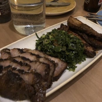 Chubby's Jamaican Kitchen - JERK PORK (1/2 LBS)$17 Pork shoulder, pork belly, sauteed seasonal greens - Caribbean Near Me - Toronto, Ontario