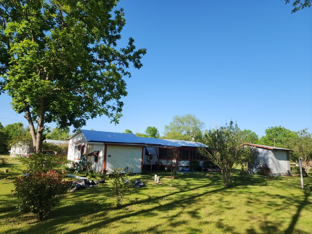 Slide of Flournoy and Sons Roofing