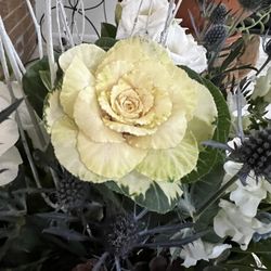 Hearts & Flowers Floral Design Studio - Winter wedding arrangement.