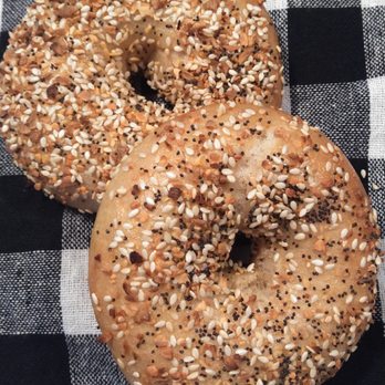 Thunder Baykery - two sesame bagels on a checkered tablecloth - Bakeries Near Me - Alpena, Michigan