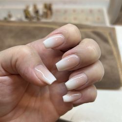 Gossip of St Charles Nails and Spa - Dip manicure, coffin shape, airbrush French. 169 is the dip color, more peachy neutral than pink. Ask for Andy! He's great!