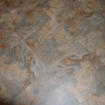 Traditional Floors - a closeup of a tiled floor - Flooring Near Me - Milan, Illinois Traditional Floors - a closeup of a tiled floor - Flooring Near Me - Milan, Illinois