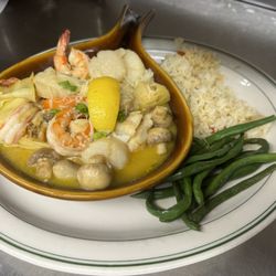 Pier 101 - Sautéed Combo! Delicious scallops,prawns and fresh northwest fish sautéed in wine, butter and garlic!