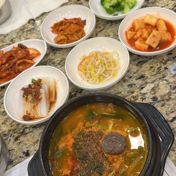 Sodeulnyuk - a variety of dishes on a table - Korean Near Me - Suwanee, Georgia