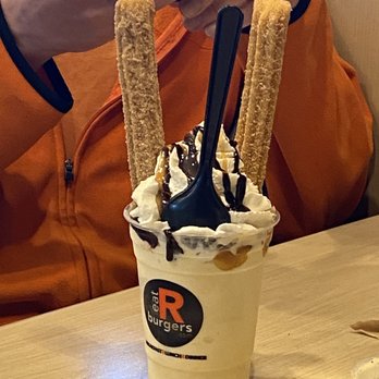 R Burgers - a person taking a picture of their dessert - Burgers Near Me - Riverside, California R Burgers - a person taking a picture of their dessert - Burgers Near Me - Riverside, California