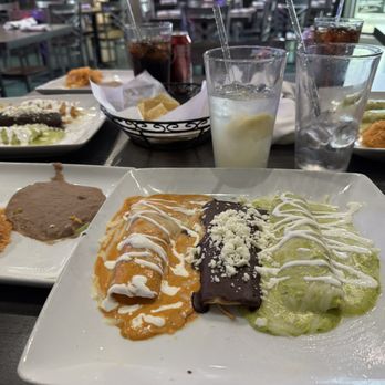 El Catrin - The trio enchiladas with refried beans and rice. * YUM * - Mexican Near Me - San Antonio, Texas