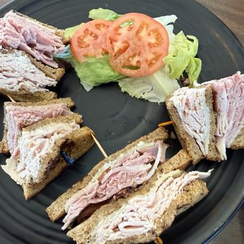 Tiny's Burger Barn - Club Sandwich with lettuce and tomato on side - Burgers Near Me - Tatum, New Mexico Tiny's Burger Barn - Club Sandwich with lettuce and tomato on side - Burgers Near Me - Tatum, New Mexico