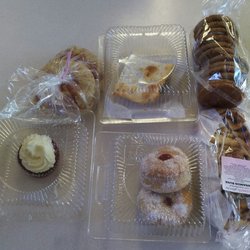 Celebrate Gluten Free - My gluten free haul, cupcake, cinnamon buns, ginger snaps, cheese buns, strawberry filled donuts and a lemon bar and a raisin bar.