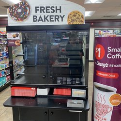 Casey's - No donuts; no prepared food in cold section; three slices of old pizza in the warmer.