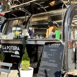 La Pote-Ria - Store front (parked by the upper level of the escalator)