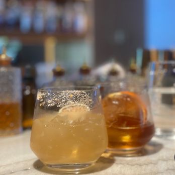 kann - Front: HEARTHFIRE tequila blend, green apple, tamarind, jerk, lemon Back: MARIE-JEANNE bourbon, aged rum, spiced rum punsch, vermut, bitters - Caribbean Near Me - Portland, Oregon