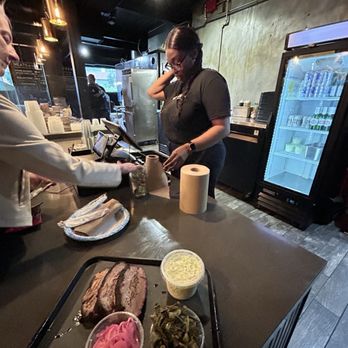 Horn Barbecue - Pit master Jordan in the background - Desserts Near Me - Lafayette, California