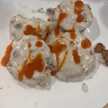 Rise & Bite Cafe - Full order of biscuits and gravy, my husband added the hot sauce before I could take the picture lol - Breakfast & Brunch Near Me - Naperville, Illinois