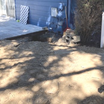 Repipe Specialists - Seattle - The hole was excavated to reroute the sewer line, and left open for weeks. - Plumbing Near Me Repipe Specialists - Seattle - The hole was excavated to reroute the sewer line, and left open for weeks. - Plumbing Near Me