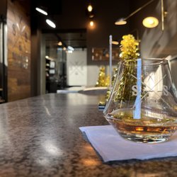 Scissors & Scotch - A Scotch or other adult beverage is included with your haircut.