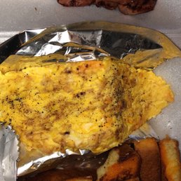 an omelet and french fries an omelet and french fries