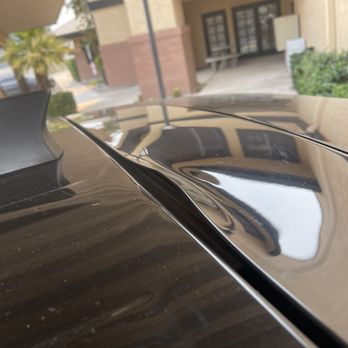 Carvana Tempe - Dent in top of car - Car Dealers Near Me - Tempe, Arizona