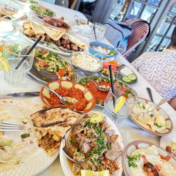 Carousel Restaurant - Forgive the empty plate, but this is their largest mezza you order per person. This is 2/3 of the entire table. - Middle Eastern Near Me - Glendale, California