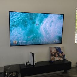 85" TV hung & mounted on full motion mount 85" TV hung & mounted on full motion mount