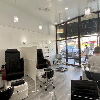 Dominic Nail Spa - Dividers between pedicure stations, plastic dividers between nail stations; clean, bright and chic space - Nail Salons Near Me - Manhattan Beach, California