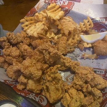 Uncle T's Oyster Bar - Oyster and alligator plate. Alligator was off tasting. Oysters and waffle fries were really good - Bars Near Me - Scott, Louisiana Uncle T's Oyster Bar - Oyster and alligator plate. Alligator was off tasting. Oysters and waffle fries were really good - Bars Near Me - Scott, Louisiana