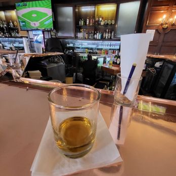 Congress Lounge - a glass of whiskey on the bar - Comfort Food Near Me - Chicago, Illinois