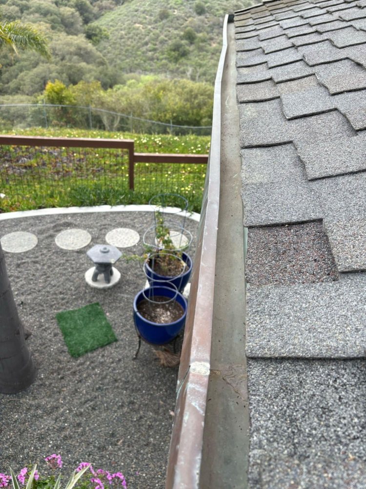 Slide of Vigil's Roofing