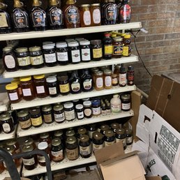 shelves of honeys and jams shelves of honeys and jams