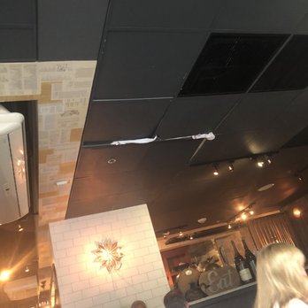 Green Pig Bistro - Napkins holding up the Ceiling Panels - New American Near Me - Arlington, Virginia Green Pig Bistro - Napkins holding up the Ceiling Panels - New American Near Me - Arlington, Virginia