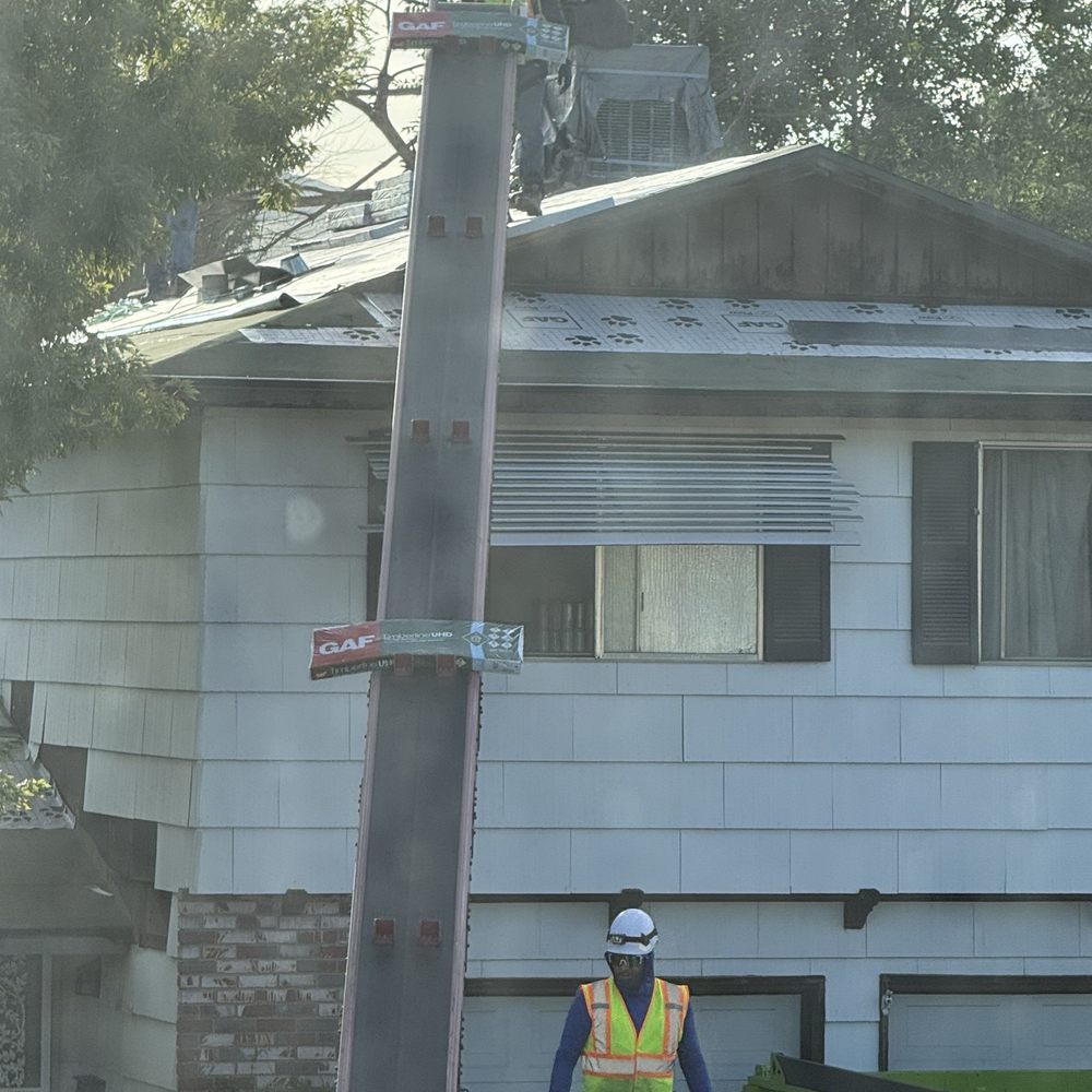 Crummett Construction & Roofing - I've never seen a conveyor belt hoist up roofing material. - Roofing Near Me - Reno, Nevada Crummett Construction & Roofing - I've never seen a conveyor belt hoist up roofing material. - Roofing Near Me - Reno, Nevada