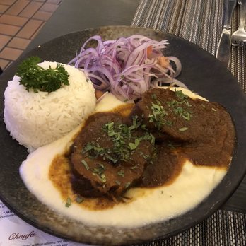 Coracora - Meat plate, Mashed potatoes, white rice, Onion Salad - Latin American Near Me - West Hartford, Connecticut Coracora - Meat plate, Mashed potatoes, white rice, Onion Salad - Latin American Near Me - West Hartford, Connecticut