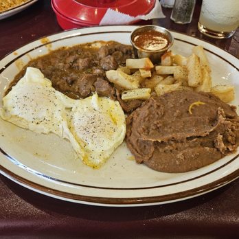 Sazon Mexican Cafe - Huevos Rancheros with Carne Guisada & homemade flour tortillas - Mexican Near Me - San Antonio, Texas