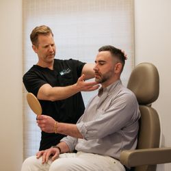 Carolina Facial Plastics - Dr. Kulbersh with a patient