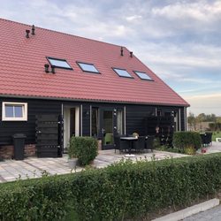 Hof Westdijk - Ferienhäuser in ehemaliger Scheune
