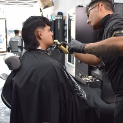 No Hype Barbershop - Jose working on a Haircut and Mustache Trim