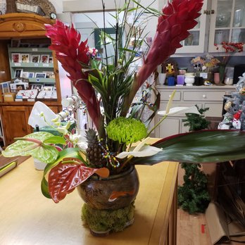 Seaside Flowers - Beautiful gourd vessel decorated with koi, by resident artist Shela Montez. Floral design by proprietor Shelly. - Florists Near Me - Oceanside, California Seaside Flowers - Beautiful gourd vessel decorated with koi, by resident artist Shela Montez. Floral design by proprietor Shelly. - Florists Near Me - Oceanside, California