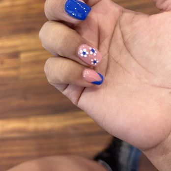 Serafina Nails & Spa - Peeling and flowers are all different sizes - Nail Salons Near Me - Goodyear, Arizona