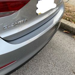 Ron Wise Auto Body - Dent pulled out, lip was formed and repainted