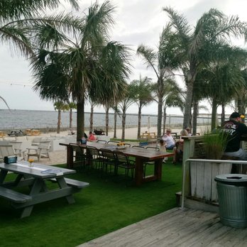 The Gulf - Drinking beachy cocktails with friends and enjoying the view. - Burgers Near Me - Orange Beach, Alabama The Gulf - Drinking beachy cocktails with friends and enjoying the view. - Burgers Near Me - Orange Beach, Alabama