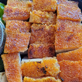 Quack House - Closeup view of crispy pork skin - Barbeque Near Me - San Francisco, California Quack House - Closeup view of crispy pork skin - Barbeque Near Me - San Francisco, California
