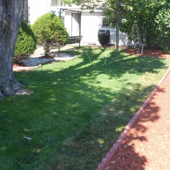Wulff Lawncare & Landscaping - a lawn with mulch and mulch - Landscaping Near Me - Highland, Indiana Wulff Lawncare & Landscaping - a lawn with mulch and mulch - Landscaping Near Me - Highland, Indiana