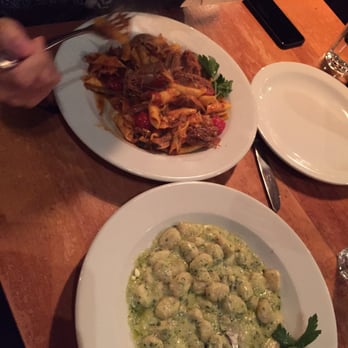 Spago Trattoria E Pizzeria - Duck special (background) and gnocchi (foreground) - Italian Near Me - Windsor, Ontario Spago Trattoria E Pizzeria - Duck special (background) and gnocchi (foreground) - Italian Near Me - Windsor, Ontario